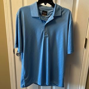 Greg Norman golf polo. Light blue. Men’s size medium